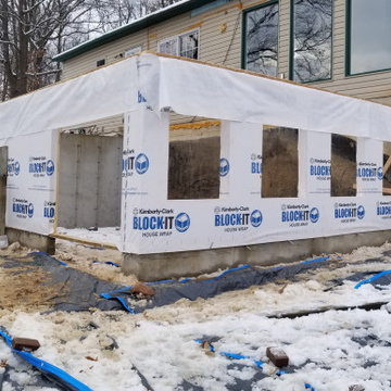 Two-Story Home Addition with Home Gym and Four Seasons Room