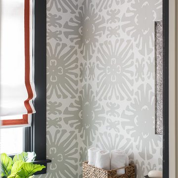 Powder room with large graphic wallpaper