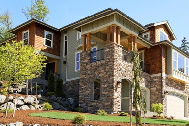 Large mountain style multicolored three-story mixed siding exterior home photo in Salt Lake City with a shingle roof