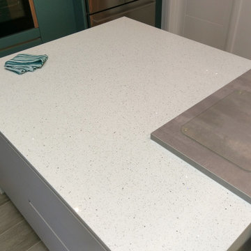 Sleek Kitchen Design in Headstone By  Kudos Interior Designs