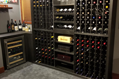 Inspiration for a mid-sized contemporary wine cellar remodel in Seattle
