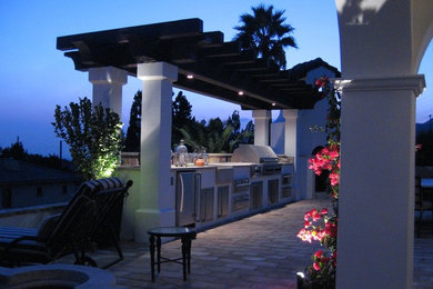 Design ideas for a large mediterranean patio in Los Angeles.