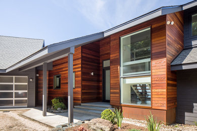 Example of a minimalist exterior home design in Other