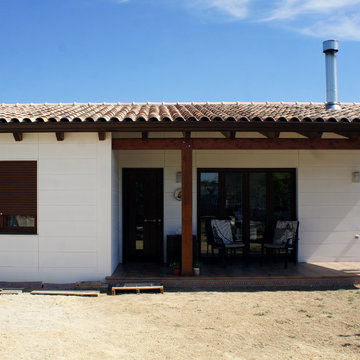 CASA CON ESTRUCTURA DE MADERA FLORADES