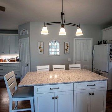 White Shaker Kitchen w/ Pietra Quartz Countertops & Gray Subway Tile Backsplash