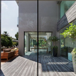 Contemporary Home with Invisible Sliders - Windows And Doors