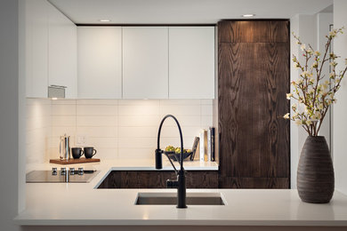 Inspiration for a small contemporary u-shaped eat-in kitchen remodel in Vancouver with an undermount sink, flat-panel cabinets, dark wood cabinets, quartz countertops, white backsplash, ceramic backsplash, paneled appliances and no island