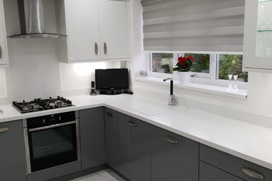 This is an example of a modern kitchen in Manchester.
