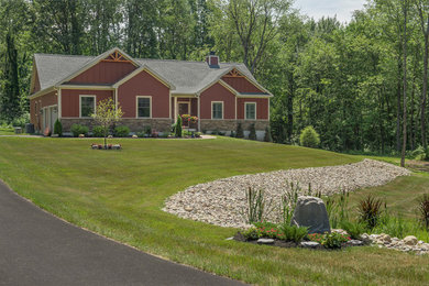 Mid-sized elegant red one-story concrete fiberboard exterior home photo in Boston