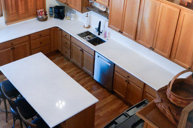 Example of a classic kitchen design in Other