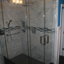 Our new Carolina Panther blue, black, grey, and white Master bath