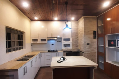 Kitchen - rustic kitchen idea in Other