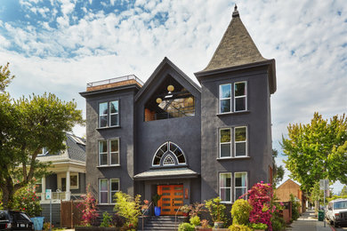 Modelo de fachada de casa negra minimalista grande de tres plantas