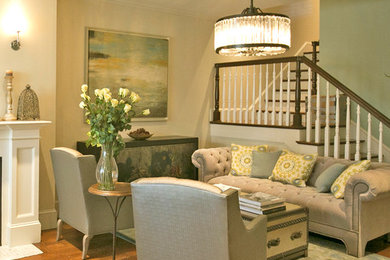Inspiration for a transitional open concept living room remodel in Boston with green walls, a standard fireplace and a stone fireplace