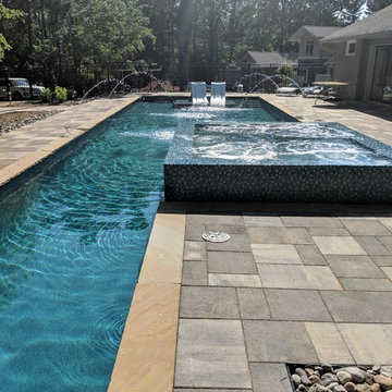 Gorgeous Glass Tile 360 Spillover Spa and lap pool