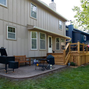 Stoerman - Cedar deck in Overland Park, Ks.  Stamped concrete patio & deck light