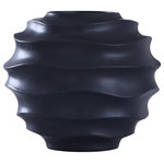 Harp and Finial - Eris Vase Matte Black Finish on Ceramic - The Eris Vase is an intriguing transitional accent made of ceramic with a matte black finish that showcases the curves and edges of the wavy lines that comprise the round shape. Every piece features slight variations in the finish that ensure it is a one-of-a-kind decorative vase. This short, round vase is a bold accent perfect for any space, including a living room, family room, hallway, foyer, dining room, or bedroom.