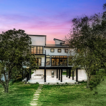 Modern Lake House Rear Elevation with Balcony Views