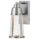 HInkley - Hinkley Miles Small Wall Mount Lantern, Satin Nickel - The transitional style of Miles channels a nautical vibe, but is equally at home in all settings. An LED JA8 lamp is included while a layered cap and backplate enhance the style. The bold, Black Coastal Elements finish and clear seedy glass add a glowing touch that is versatile enough to perfectly accent any decor. Miles is constructed in Coastal Elements making it resistant to rust and corrosion and features a 5-year warranty.