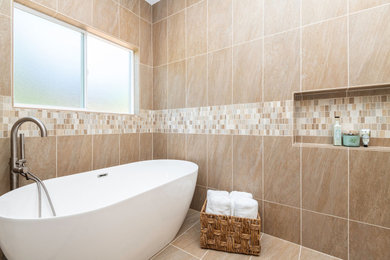 Inspiration for a mid-sized transitional master beige tile and porcelain tile porcelain tile, beige floor and double-sink bathroom remodel in San Francisco with shaker cabinets, dark wood cabinets, a one-piece toilet, beige walls, an undermount sink, quartzite countertops, a hinged shower door, white countertops, a niche and a built-in vanity