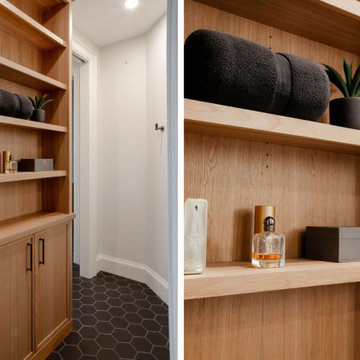 White Oak Jack and Jill Bathroom with Custom-Built Wall Storage