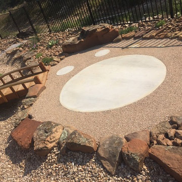 Custom concrete telescope pad w/ xeriscape, dry creek bed and bridge