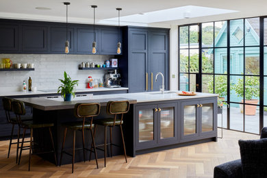 Photo of a transitional kitchen in London.