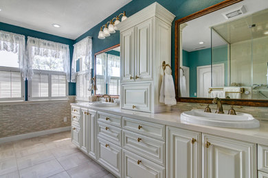 Inspiration for a large traditional master bathroom in San Diego with raised-panel cabinets, beige cabinets, beige tile, ceramic tile and engineered quartz benchtops.