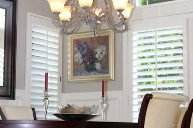 Inspiration for a small timeless light wood floor kitchen/dining room combo remodel in San Diego with beige walls and a standard fireplace