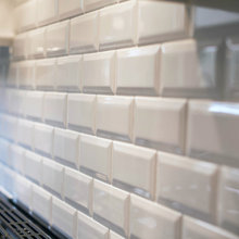beveled subway tile backsplash
