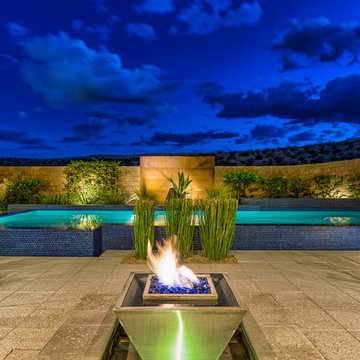 Raised Rim Flow Pool with Custom Fire/Water Feature