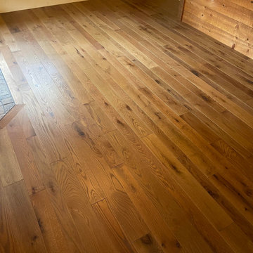 A BEAUTIFUL PREFINISHED FUMED RED OAK FLOORING JUST INSTALLED BY OUR TEAM!