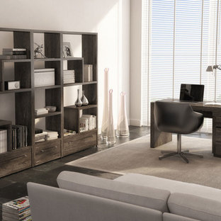 Photo of a modern study room in Vancouver with white walls, slate floors and a freestanding desk.