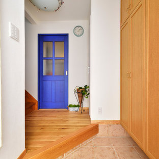 他の地域のコンテンポラリースタイルのおしゃれな玄関の写真