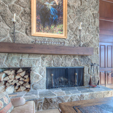 Moss Rock Fireplace with Reclaimed Rustic Oak Mantel