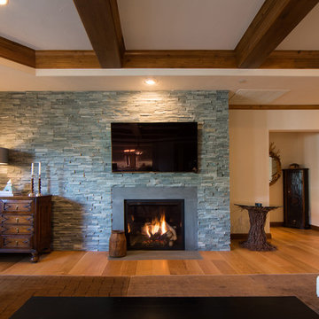 Traditional Modern Living Area with Stacked Stone Fireplace