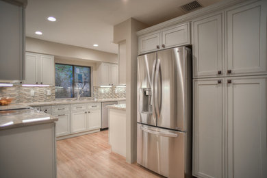 Design ideas for a transitional kitchen in Phoenix.