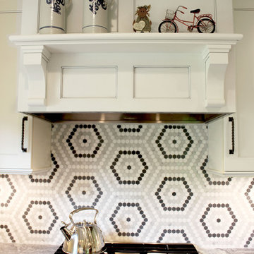 White Cabinets, Grey Countertops and Edgy Tile Backsplash