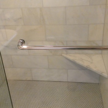 BATHROOM - Calcutta Gold Marble Shower / Gray Penny Tile Floor