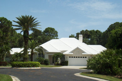 Island style exterior home photo in Tampa