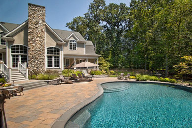 Inspiration for a mid-sized traditional backyard landscaping in Boston.