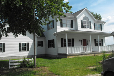 Example of a classic exterior home design in Other