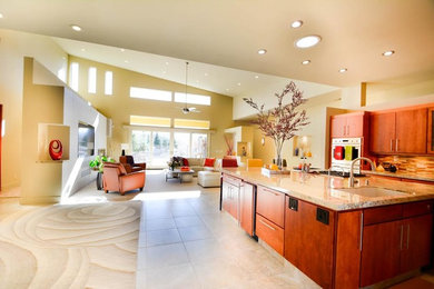 Eat-in kitchen - large contemporary l-shaped ceramic tile eat-in kitchen idea in Other with a double-bowl sink, flat-panel cabinets, medium tone wood cabinets, granite countertops, beige backsplash, ceramic backsplash, stainless steel appliances and an island
