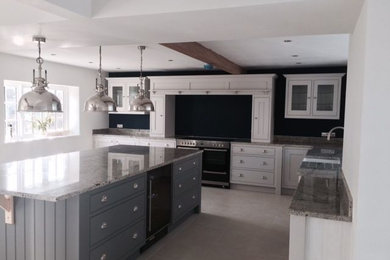 Handmade kitchen by Aberford Interiors painted in Farrow and Ball Blackened and