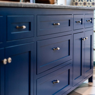 Large eclectic kitchen pantry photos - Inspiration for a large eclectic u-shaped porcelain floor and multicolored floor kitchen pantry remodel in San Luis Obispo with shaker cabinets, white cabinets and two islands