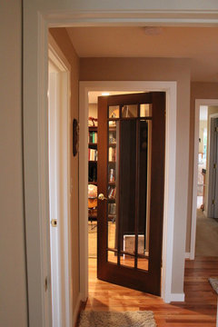 Combining painted trim with wood-stained interior doors