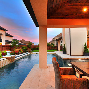 ヒューストンの大きい長方形モダンスタイルのおしゃれなプール (タイル敷き) の写真