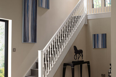 Exemple d'un escalier tendance en L de taille moyenne avec des marches en bois.