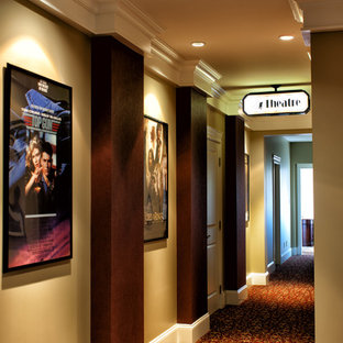 Inspiration for a small timeless enclosed carpeted home theater remodel in Vancouver with red walls and a projector screen