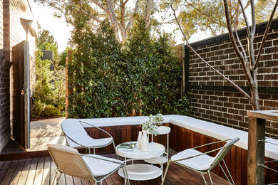This is an example of a contemporary deck in Melbourne with no cover.